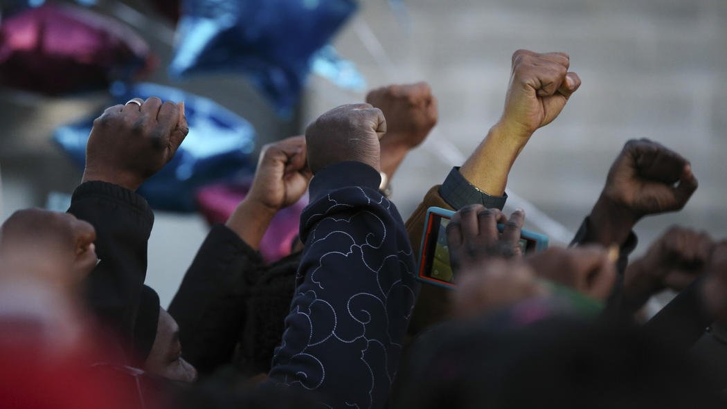 chicagotribune's tweet photo. More than 100 people hold vigil at scene where 16-year-old boy was fatally shot by police https://t.co/IIKYDP8cUb https://t.co/t5CEqDwAAF