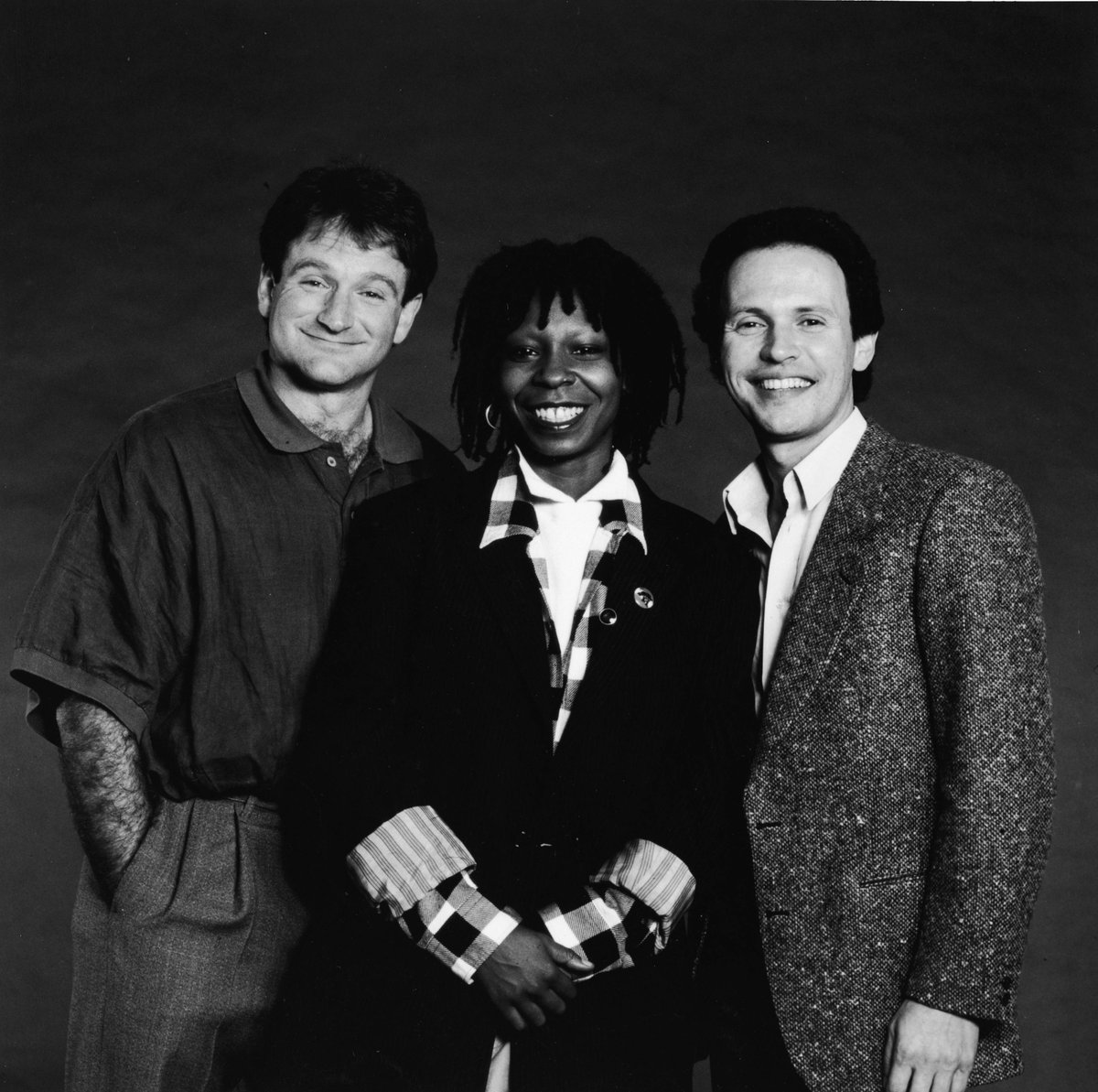 Robin williams, whoopi goldberg, and billy crystal in 1986.