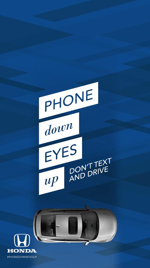 Honda's tweet photo. Introducing #PhoneDownEyesUp to help prevent distracted driving. Save and set as your lock screen as a reminder. https://t.co/Y0ImutqQwS