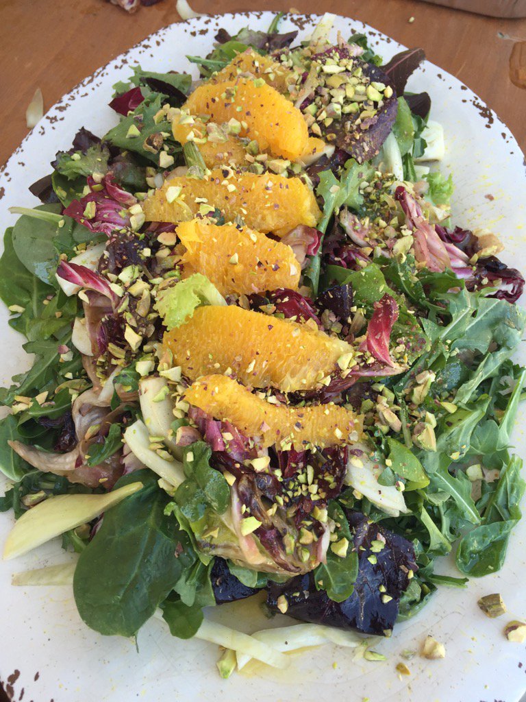 One of our sig Tuscan salads, grilled radicchio &amp; fennel over arugula w/ a citrus vinaigrette &amp; toasted pistachios.