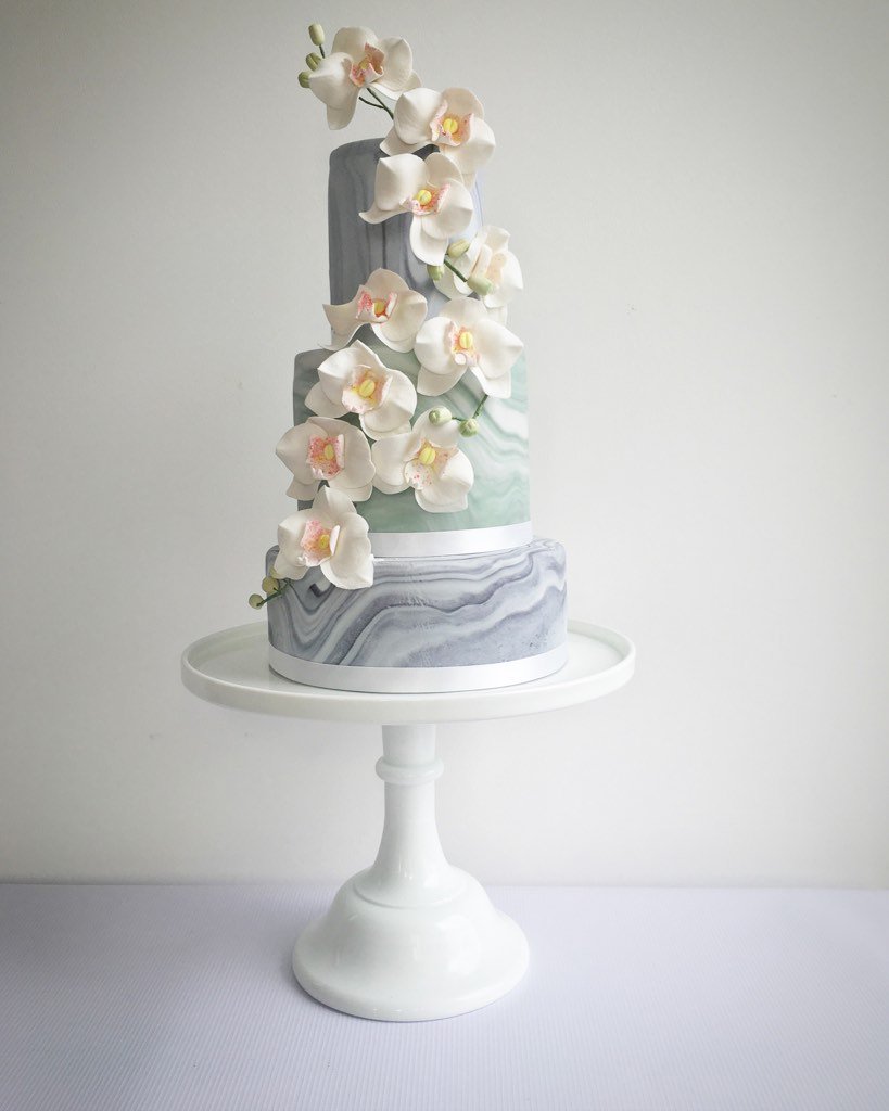Marble and sugar orchid cake #weddingcake #weddingwednesday #weddingsupplier #london #luxury #bespokecake #bridetobe