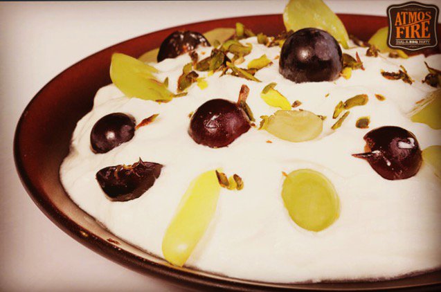 GetAtmosfire's tweet photo. Try out our special dessert, #PersianGrapes with cream which is also topped with delicious dry fruits! #Atmosfire https://t.co/5BiSEiR8os