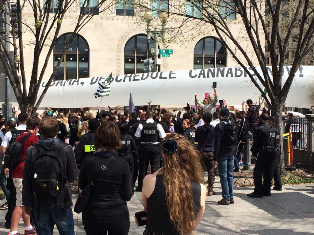 gregorykorte's tweet photo. I found the cannabis protest over by the Treasury Department. They're holding a 51-foot inflatable joint. https://t.co/vacY1e0NUF