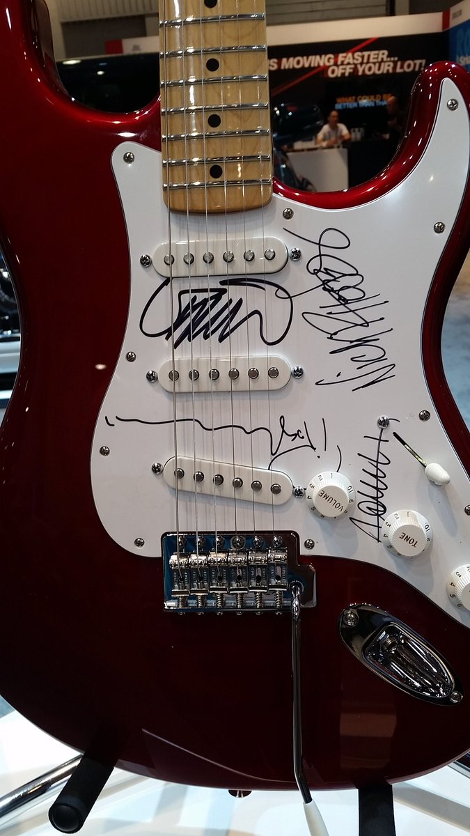 richardblade's tweet photo. Today at #NADA2016  Vegas SiriusXM is giving this away Recognize the signatures? @SiriusXMAuto #rockwithsiriusxm https://t.co/gl0SlzbxkX