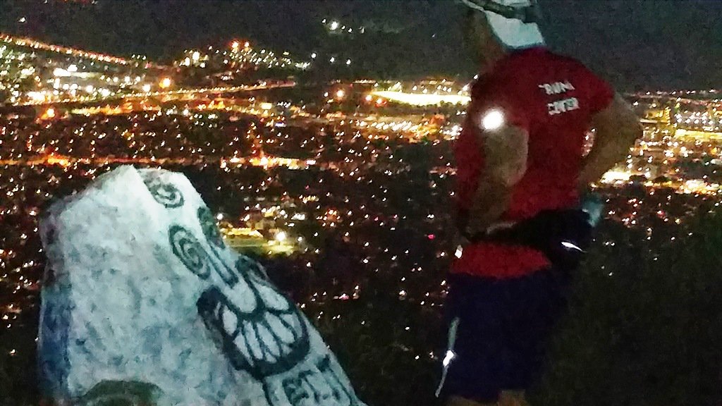 rogue_staffer's tweet photo. Night-ops trail running in Glendale.Tim looking down 1,800 ft at the city lights from Mt. Thom. #mtthom #beaudryloop https://t.co/4wJ0drUMTM