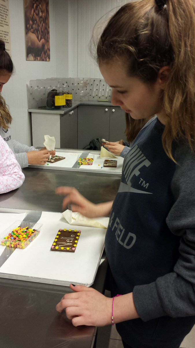 StmarthasM's tweet photo. The choir had fun decorating chocolate slabs with white chocolate and smarties. Everyone is now safely home! https://t.co/MYgEG3aWy2