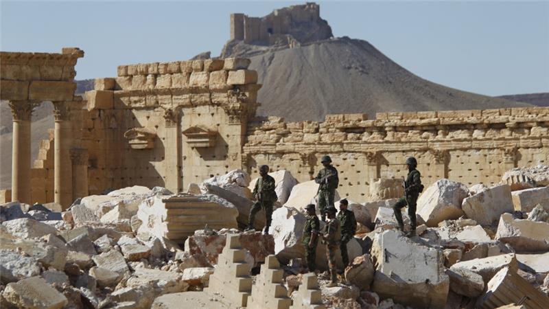 AJENews's tweet photo. Mass grave discovered in Syria's recaptured Palmyra, state media says. https://t.co/CESy01Dg5m https://t.co/lbvBf5sgPW