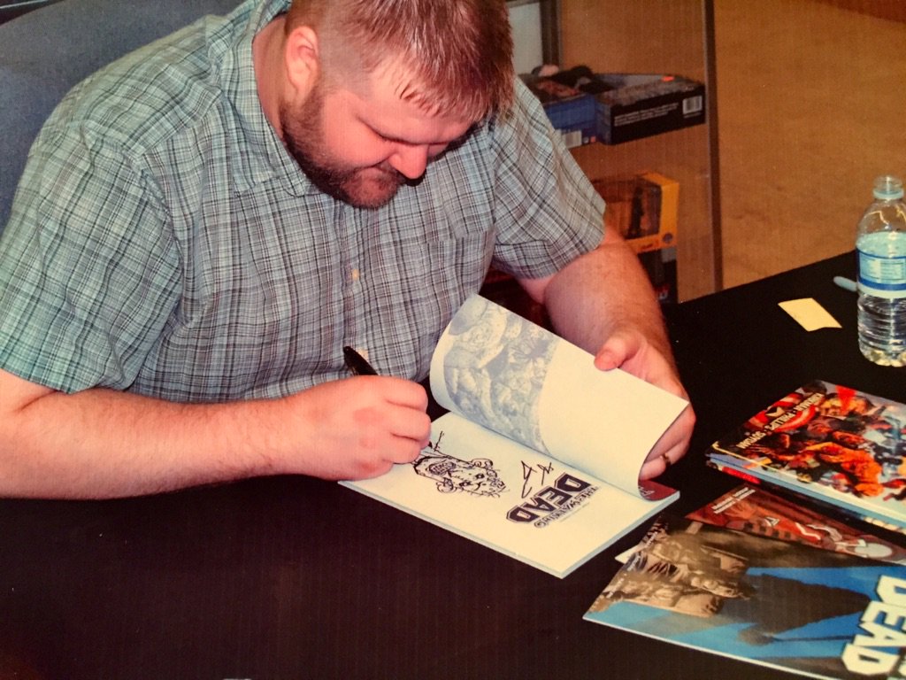 JeffDMorgan's tweet photo. May of 2009, #RobertKirkman signing hardbound #TWD at #MileHighComics in Denver, Colorado. He signed all my books. https://t.co/TcEMTukAq8