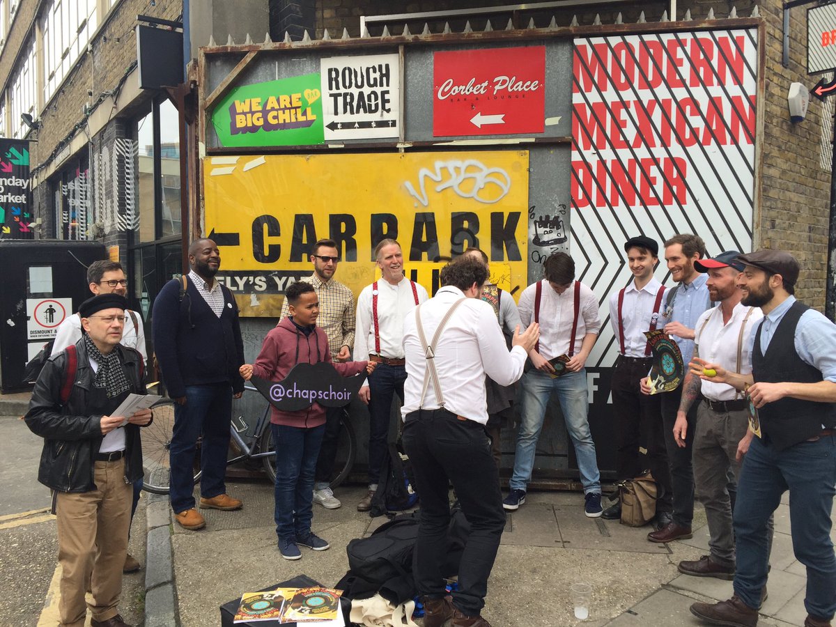 ChapsChoir's tweet photo. Chaps flashmob happening now, Hanbury St E1... #ChapMob #ChapsAtTheChapel https://t.co/kmGaxs1e8N