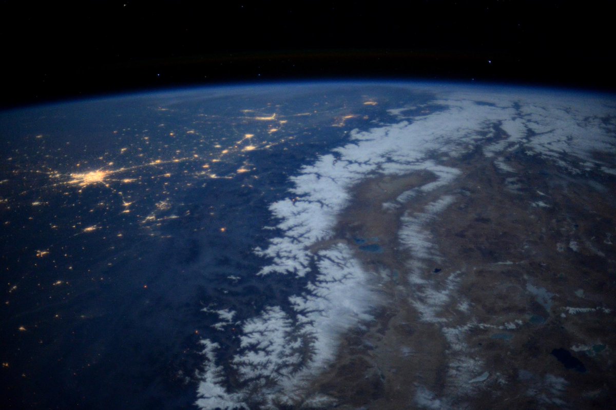 astro_timpeake's tweet photo. A moonlit pass-by of Delhi and the Himalayas https://t.co/nU8kWpWFWe https://t.co/YDMy6v5Abd