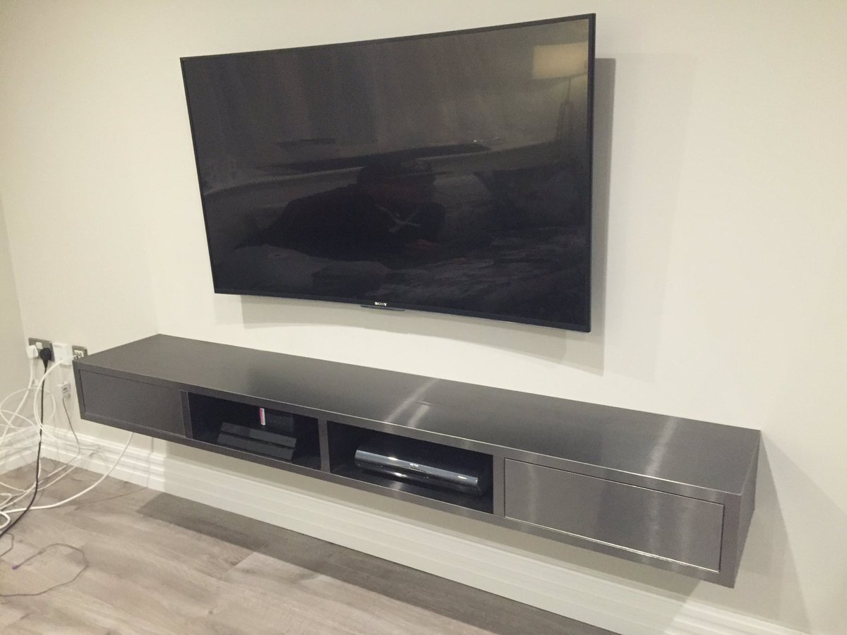 taylorbespoke's tweet photo. Floating Tv Unit made from brushed steel  with push open storage #taylorandcook #joinery #luxuryinteriors #tvunit https://t.co/hBf47ajvmh