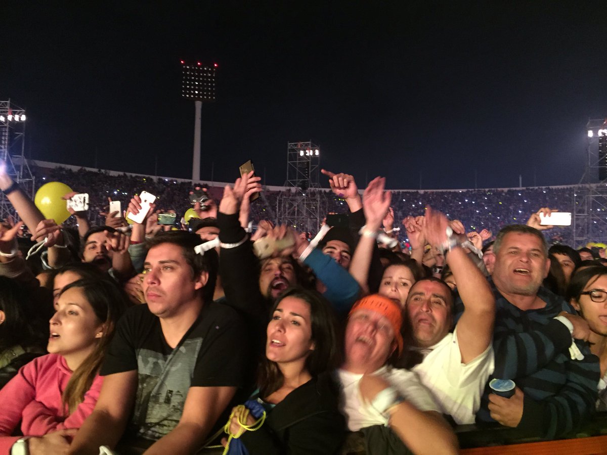 coldplay's tweet photo. Seriously excited crowd here in Santiago .. Well, maybe except for one 😉 PH https://t.co/bXSmImQ5am