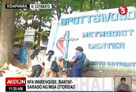 News5PH's tweet photo. #TV5AksyonsaTanghali | NFA warehouse, bantay-sarado ng mga otoridad. Umaaksyon si @PaoloAnota https://t.co/IietZmFIbu