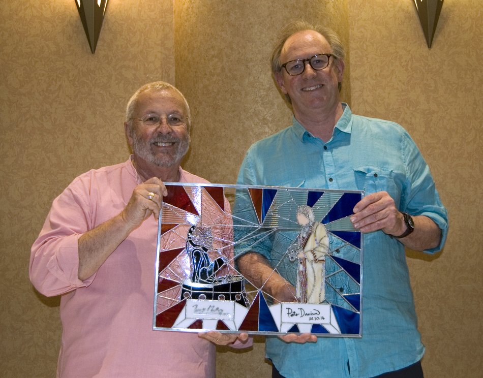 TheGlassyGeek's tweet photo. @tuckerspatch and #PeterDavison holding my stained glass panel created in their honor. :) @bbcdoctorwho @BBCAMERICA https://t.co/nVhfhAUlcK