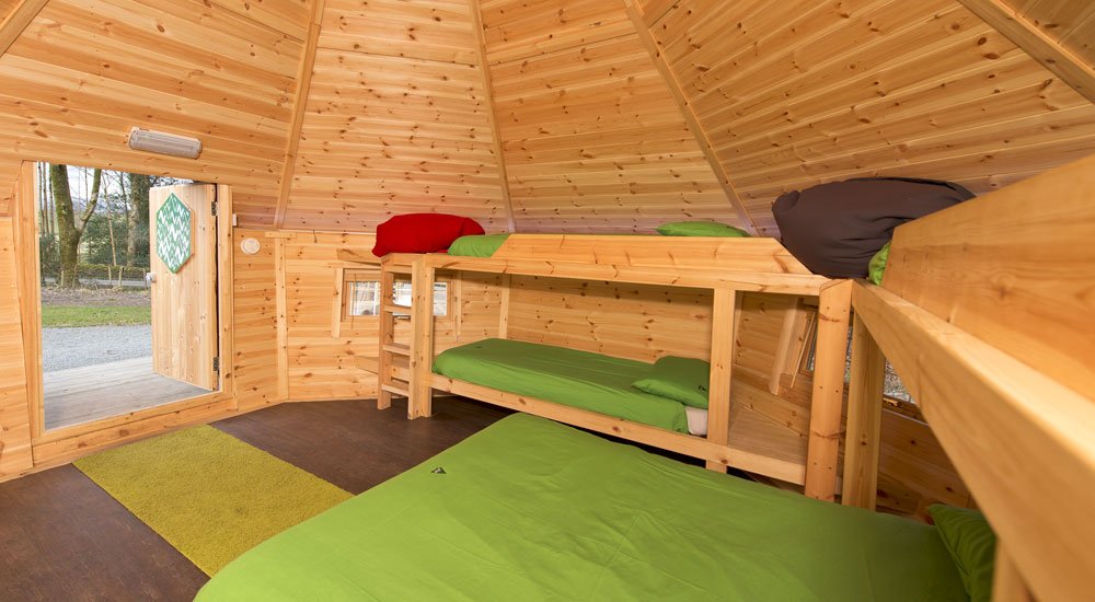 YHAOfficial's tweet photo. Stay in one of #YHA Hawkshead's 8 wooden #camping pods or their cosy cabin! https://t.co/bP7DSMQGMV #glamping #Lakes https://t.co/6RjCYX452b