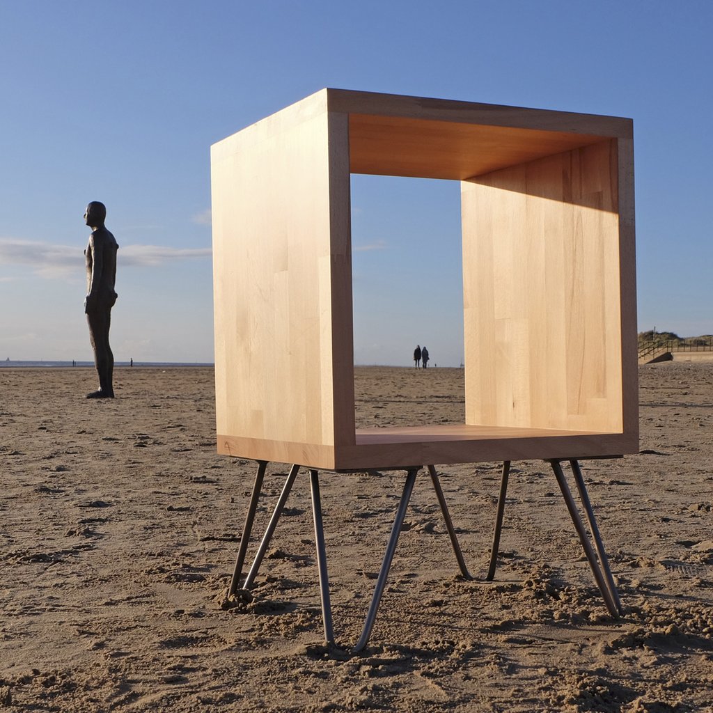 IronMenCrosby's tweet photo. An unusual visitor to Crosby beach. Modern art meets modern furniture :-) via @123cubed #IronMenCoast https://t.co/faVKa3IpKJ