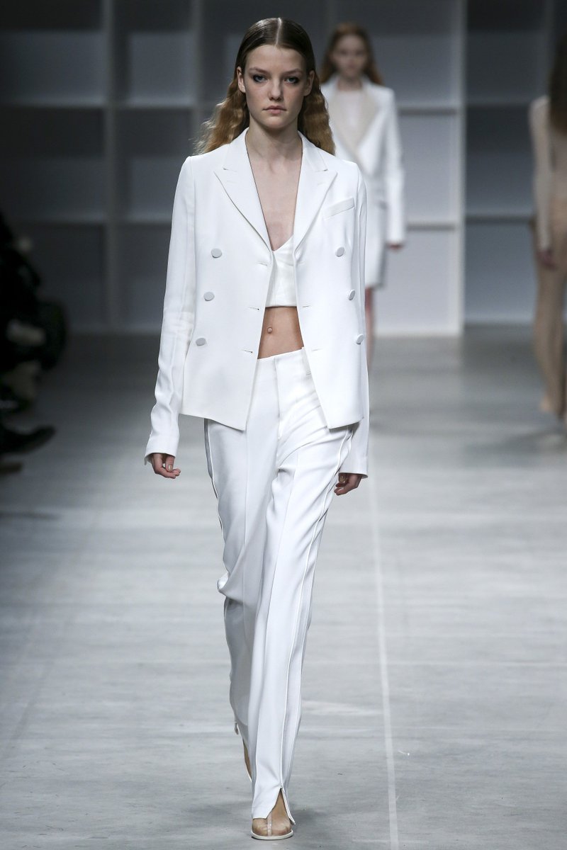 Ruby rose wore a white #aquilanorimondi fall 2016 suit + cutout top to