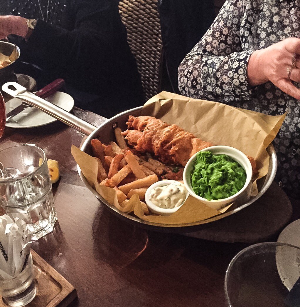 WeWantPlates's tweet photo. "Here's your fish and chips. Enjoy."

*cuts fish, pan rotates, handle knocks drink over*

(Pic: @stevepullan) https://t.co/SEC55z1ylh