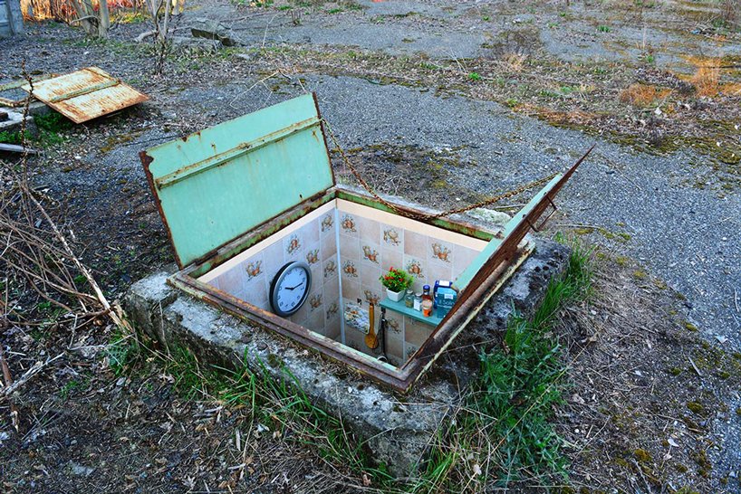designboom's tweet photo. artist biancoshock hides tiny underground rooms inside manholes in milan https://t.co/IXxpBnJNpc https://t.co/dii01Ksme7