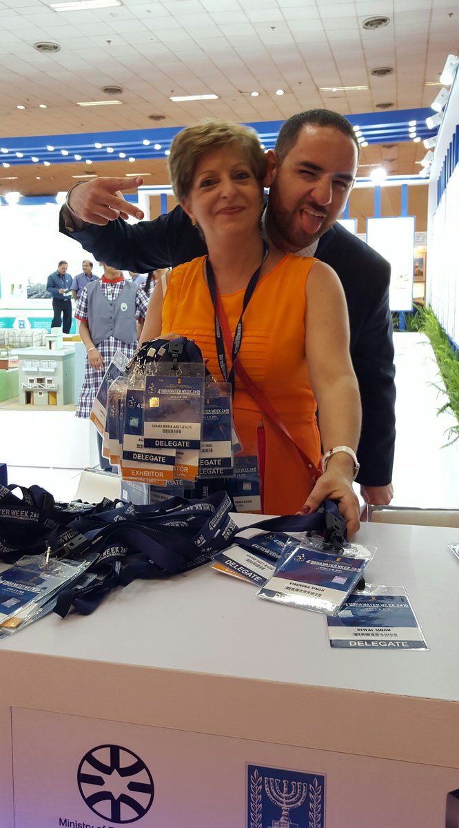 Froim's tweet photo. Our (hash)tag lady and boogie man. Clearly having fun at #WaterWeek #ClearlyIsrael looking forward to seeing you! https://t.co/VVSJvl0i7s