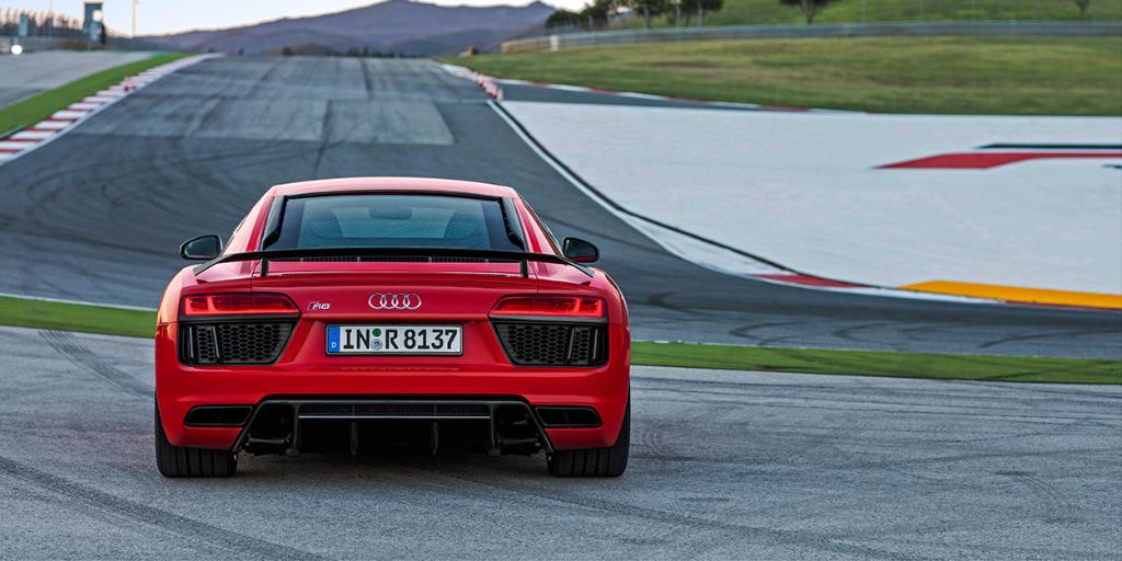 Audi's tweet photo. Half of this car won a 24-hour race. The other half is street legal. #WantAnR8 https://t.co/FWvMM6mLaf