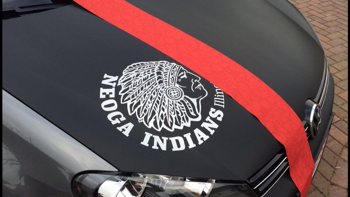 Eric, our 2014-15 exchange student, gets a new car and displays his Neoga Pride!