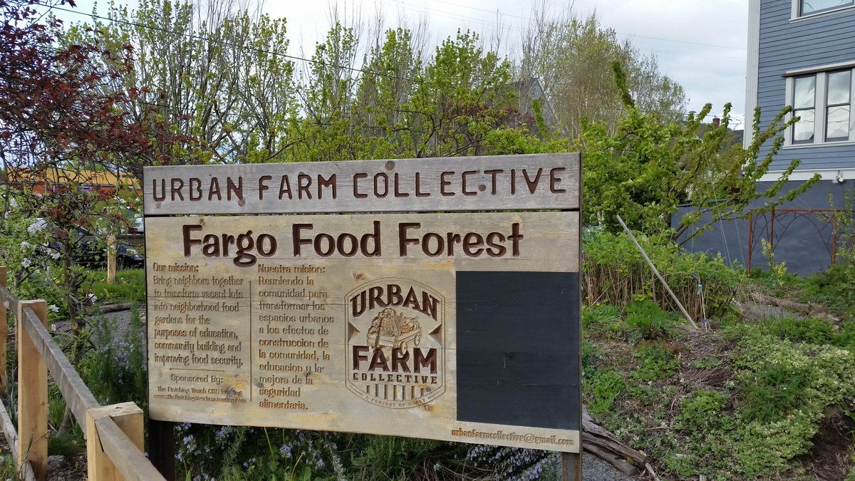 susands's tweet photo. Nathan McClintock speaking about Urban Ag and Food Justice at #AIAEE. I noticed this garden last night. https://t.co/bB8TESz6YA