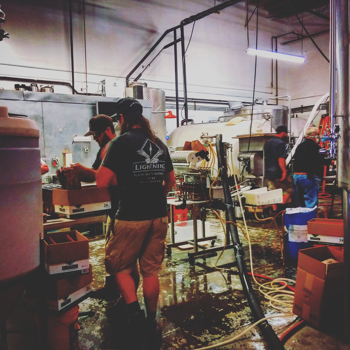 The boys are working hard today in the brewery, bottling beer. #boysworkinghard #bottlingday