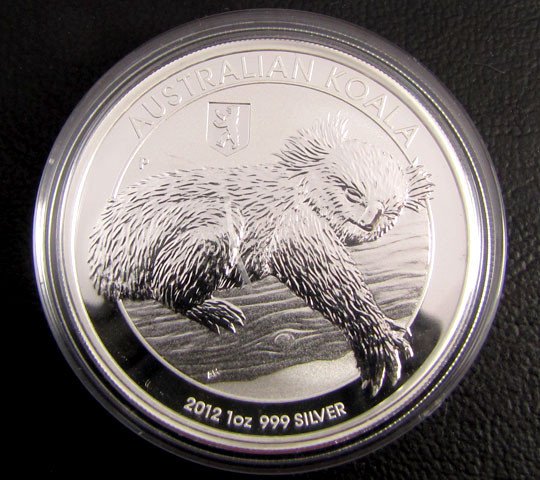 CAuctioned's tweet photo. Bear Privy in a $1 Australian coin. Hidden treasures like this are exciting to find. https://t.co/bFisjIbG3E