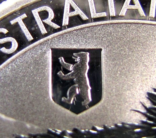 CAuctioned's tweet photo. Bear Privy in a $1 Australian coin. Hidden treasures like this are exciting to find. https://t.co/bFisjIbG3E