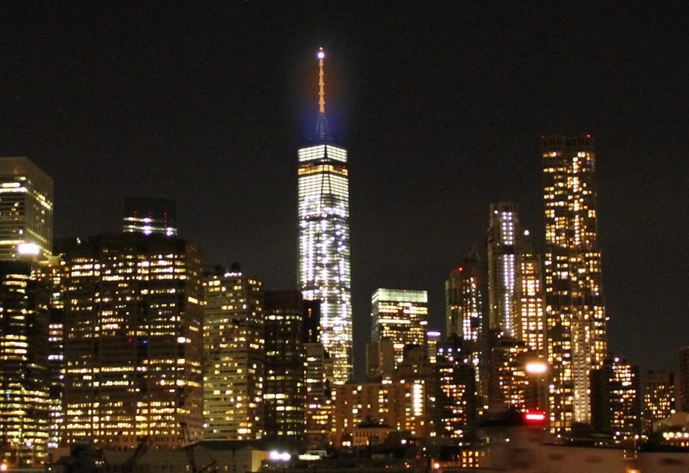 Y94Syracuse's tweet photo. The World Trade Center lit up Orange and Blue for #Syracuse Women's Basketball! Go #Cuse https://t.co/7cPq6SdLih https://t.co/flkU4dWXgq
