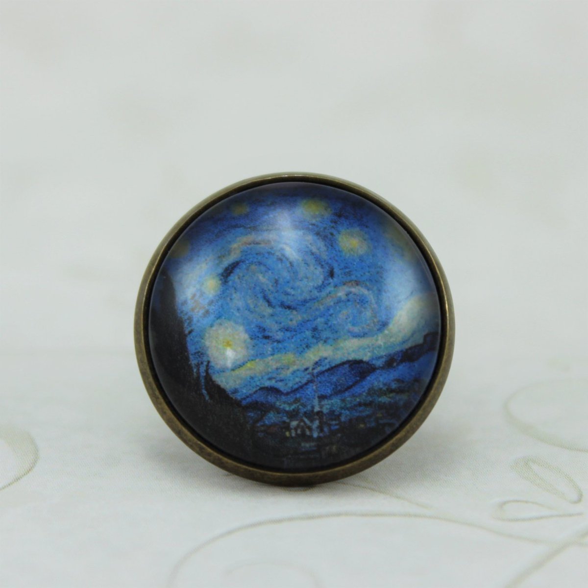 monalaina's tweet photo. The Starry Night by Vincent Van Gogh Pin, Antique Bronze, Vintage Style Pi… https://t.co/2tirnTKHCK #art #ArtButtons https://t.co/SvXcdJf6gb