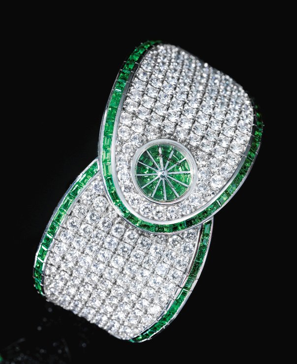 Sothebys's tweet image. Lady's White Gold, Diamond &amp;amp; Emerald-Set Bangle Audemars Piguet  fetches HK$1.6m / US$210k #Sothebyswatches