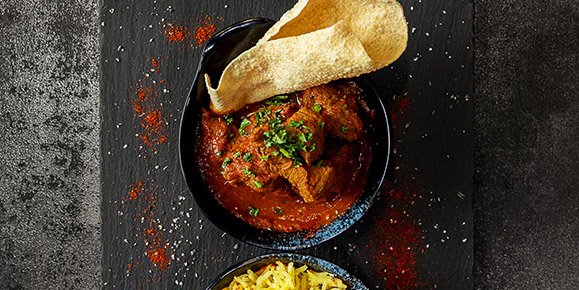 CosmoDerby's tweet photo. You've made it to the middle of the working week. Treat yourself to a #curry - with all the trimmings. #onesetprice https://t.co/uivXGrrPpH