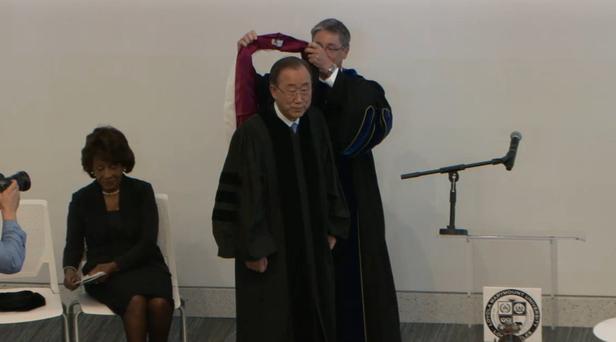 LoyolaMarymount's tweet photo. Degree conferral ceremony concludes with a standing ovation for #UNSG Ban and hooding from Pres. Snyder! #BKMatLMU https://t.co/Nh39S1nYUg