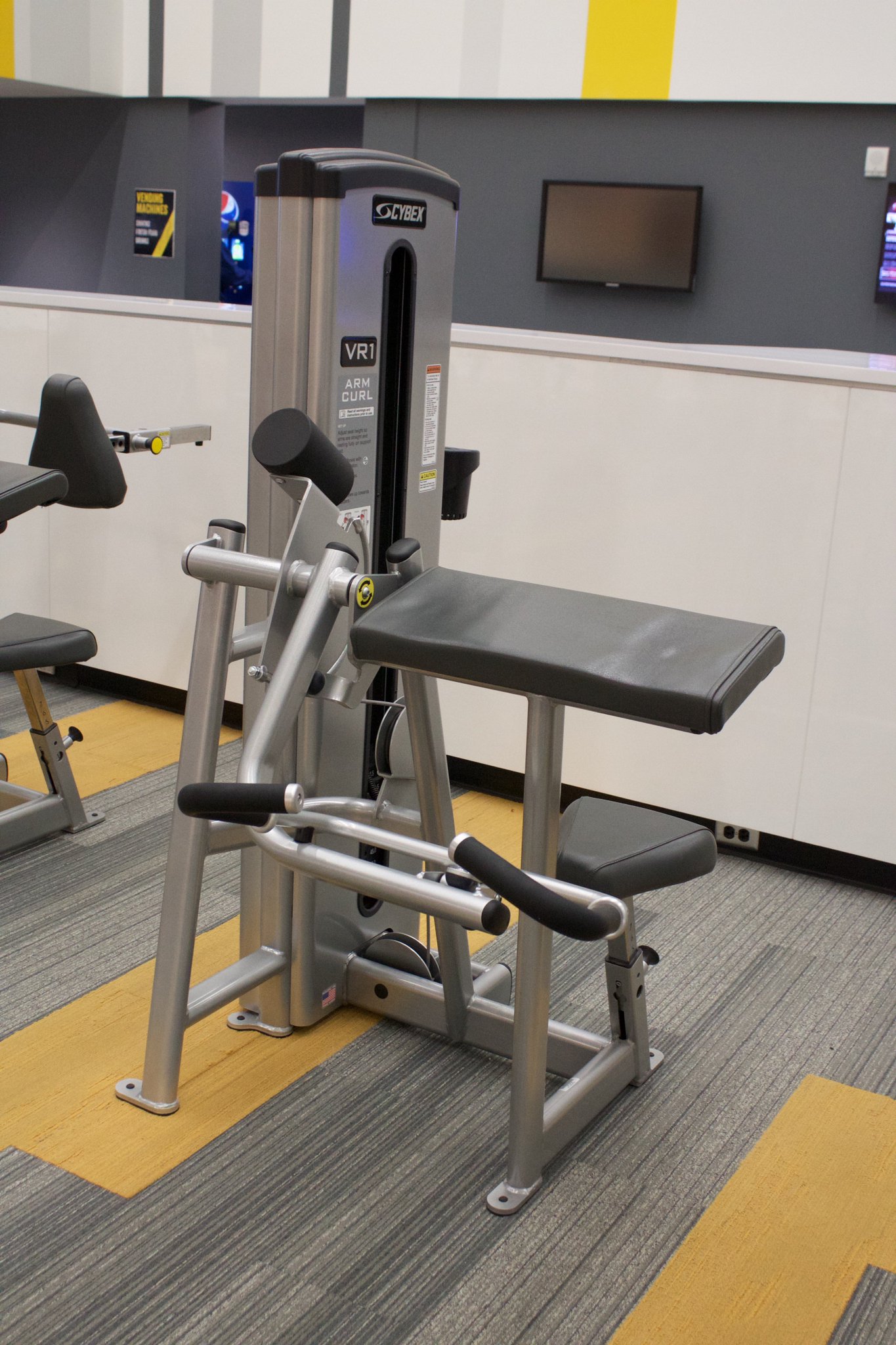 Cybex arm curl machine clearance