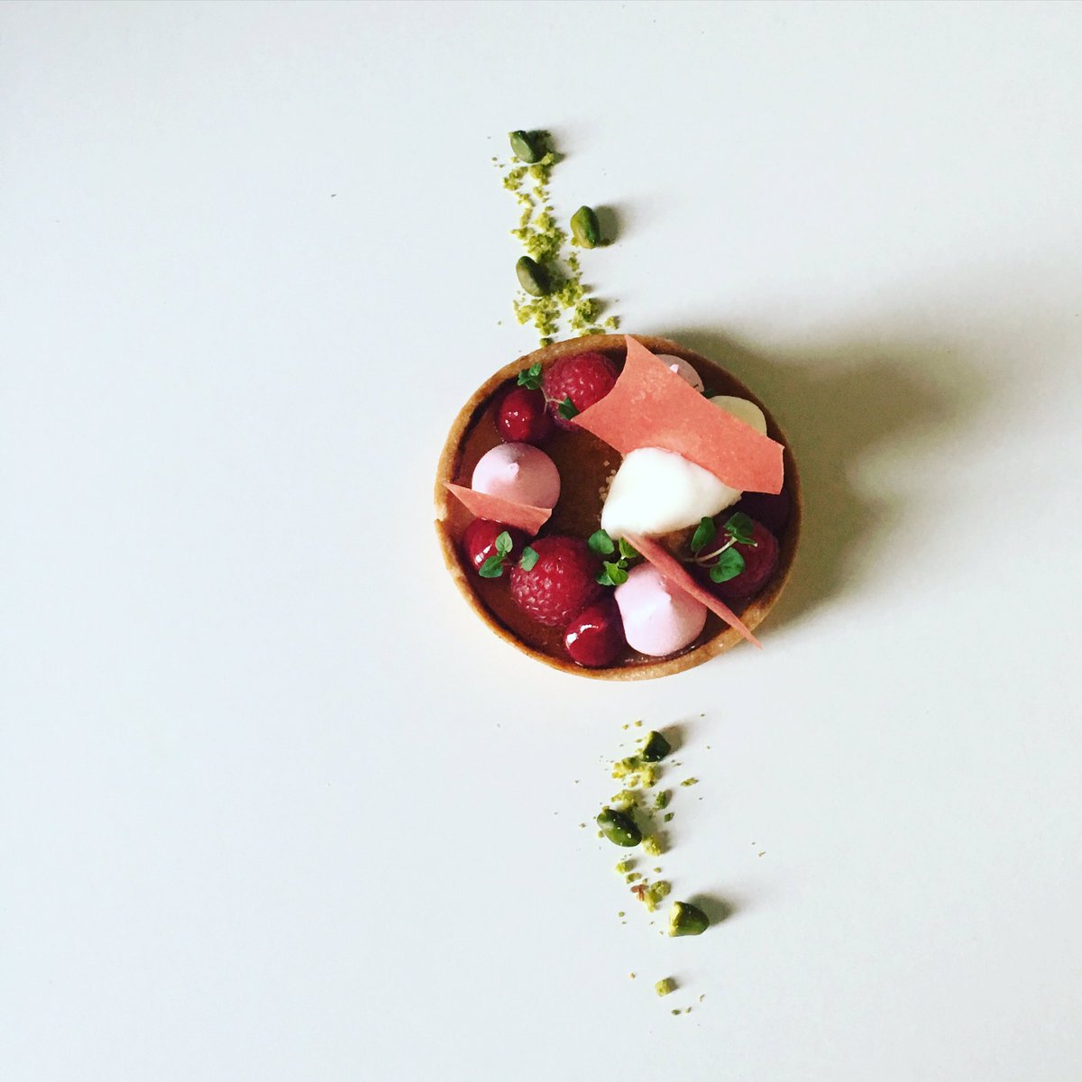 chefashb3's tweet photo. Lemon tart, raspberry, pistachio, fromage blanc sorbet. @MiddlethorpeHal https://t.co/JpjZpdZaKd