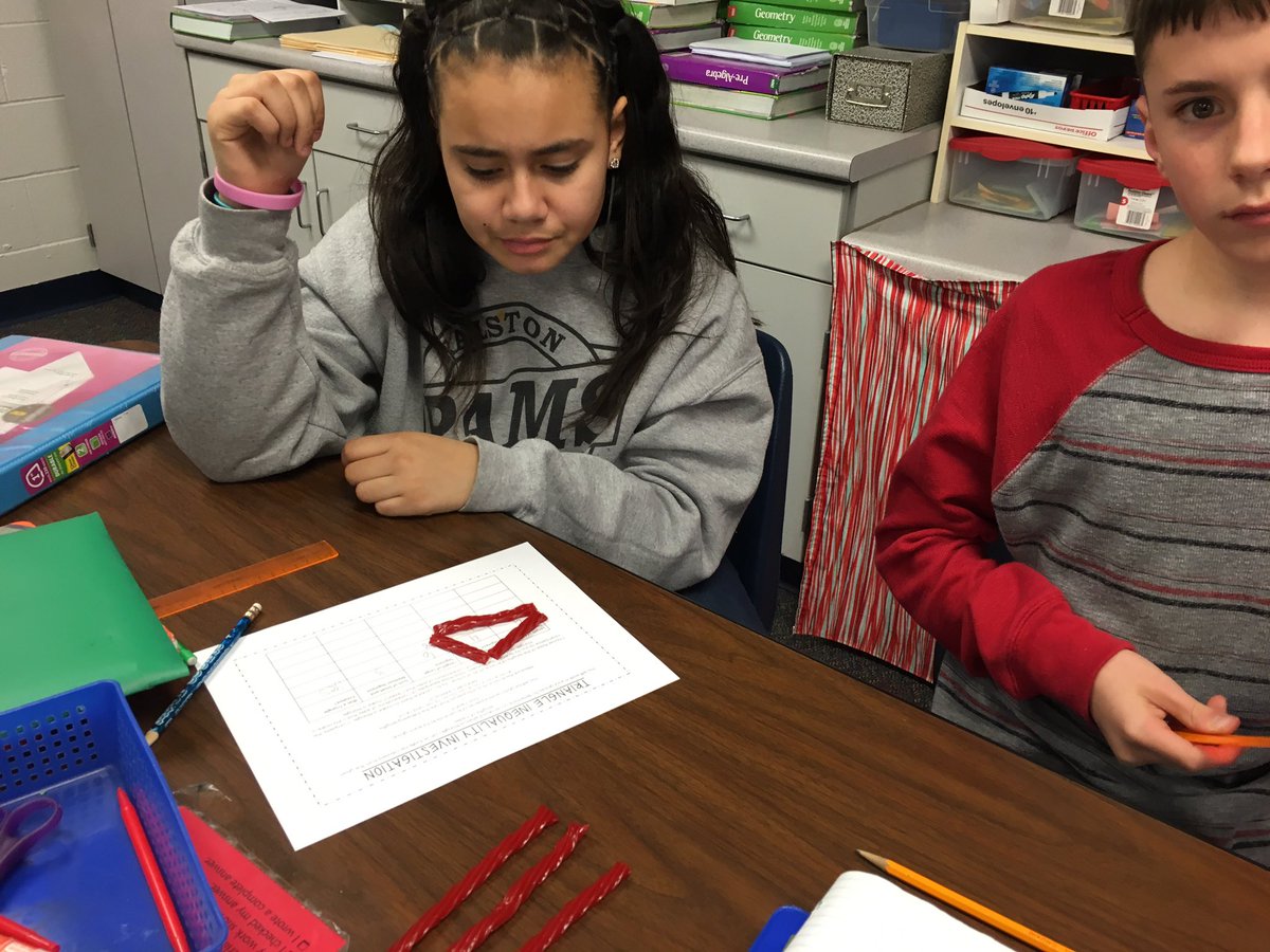 chris_redemske's tweet photo. Food always makes class more fun! @RalstonMS students discovering triangle properties. #mathisawesome https://t.co/gXUcu7sfWm