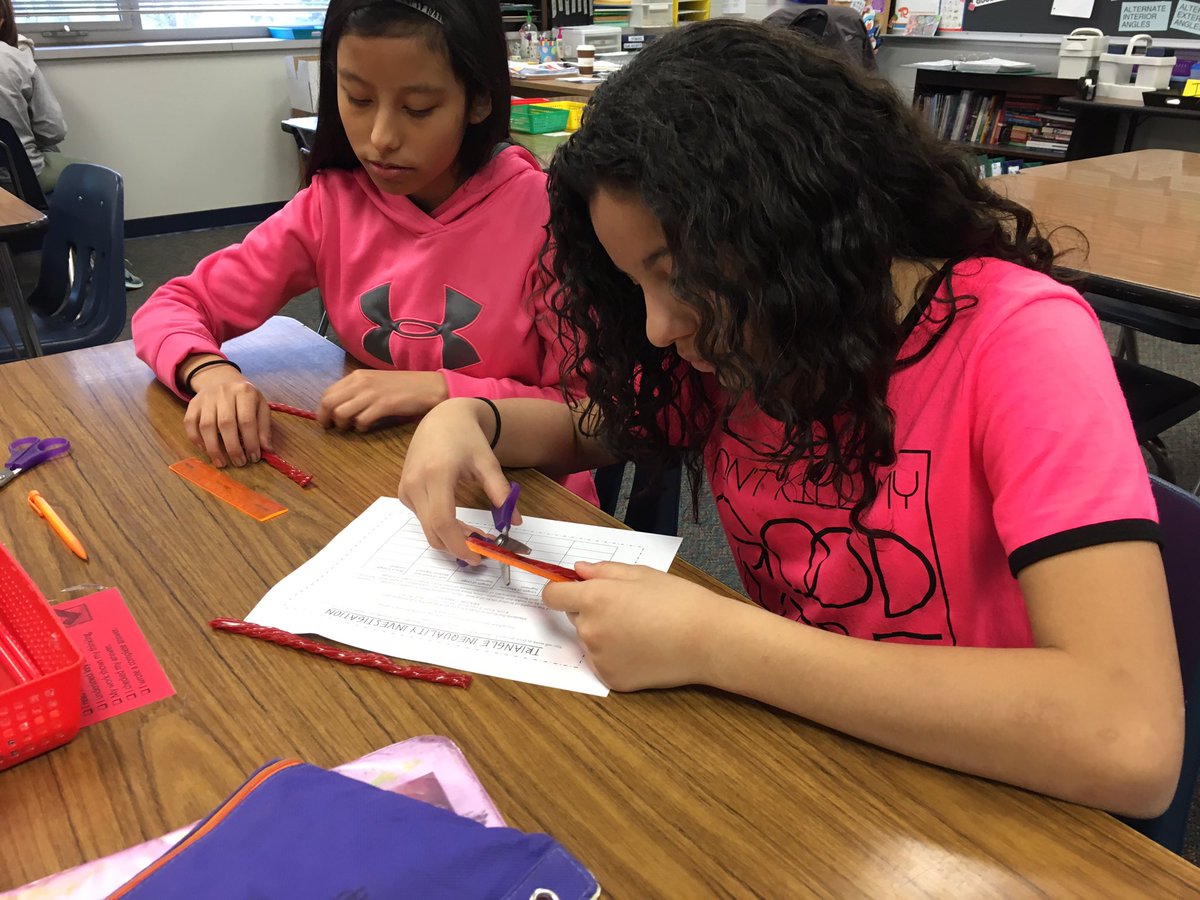 chris_redemske's tweet photo. Food always makes class more fun! @RalstonMS students discovering triangle properties. #mathisawesome https://t.co/gXUcu7sfWm