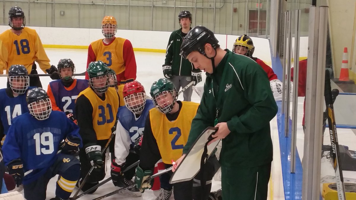 Shen asst. Coach Bryan Hunter sets up a drill for the 60+ players trying out for the <a href="/Section2Hockey/">Section II Hockey</a> wrap tryouts