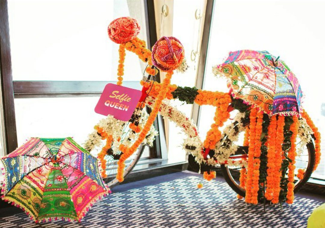TheWeddingCo_In's tweet photo. #Photoboothprop. A #bicycle #decorated with #marigold #flowers. 📸#weddingplanners #weddings #weddingstylist #vintage https://t.co/pHFChbcdtA