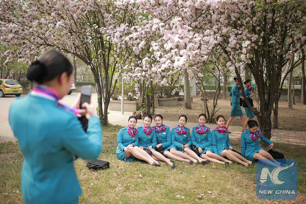 XHNews's tweet photo. Students major in #CabinAttendant get new spring uniforms at China's Civil Aviation University in N Tianjin https://t.co/jZFBBlukO3