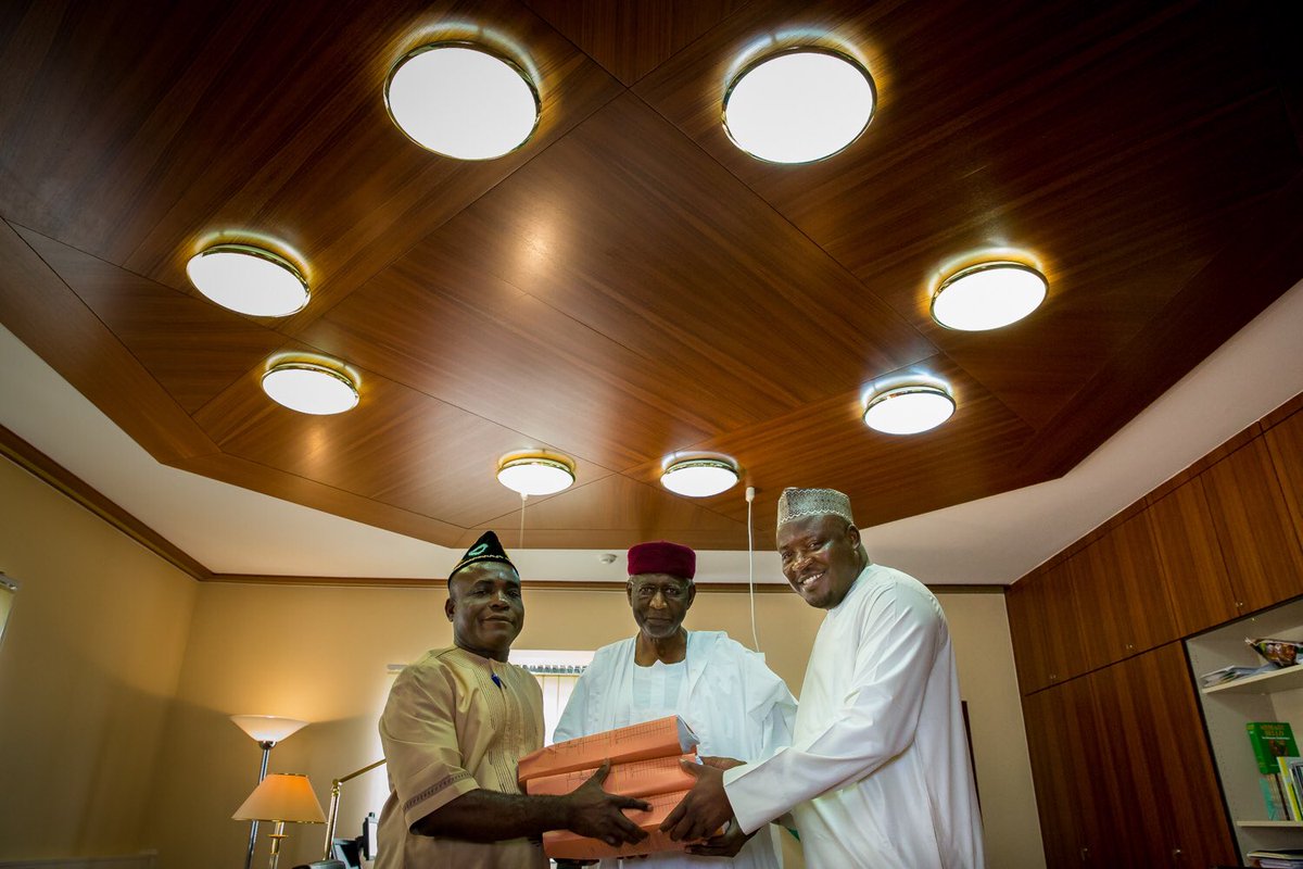 NGRPresident's tweet photo. Chief of Staff Abba Kyari receives #Budget2016 from SSAs National Assembly Matters Eta Enang and Kawu Ismaila https://t.co/9UXzIY9zkT