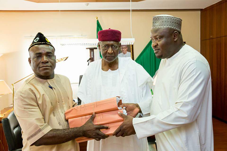 GarShehu's tweet photo. Chief of Staff to @NGRPresident, Abba Kyari receives the 2016 budget details from Sen. Eta Enang &amp; Hon. Kawu Ismaila https://t.co/DQCO4zXr2F
