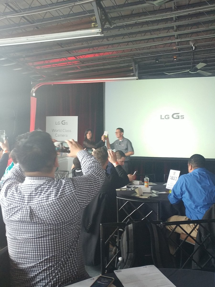 Karen and Steve holding up the G5. #LGG5NYC