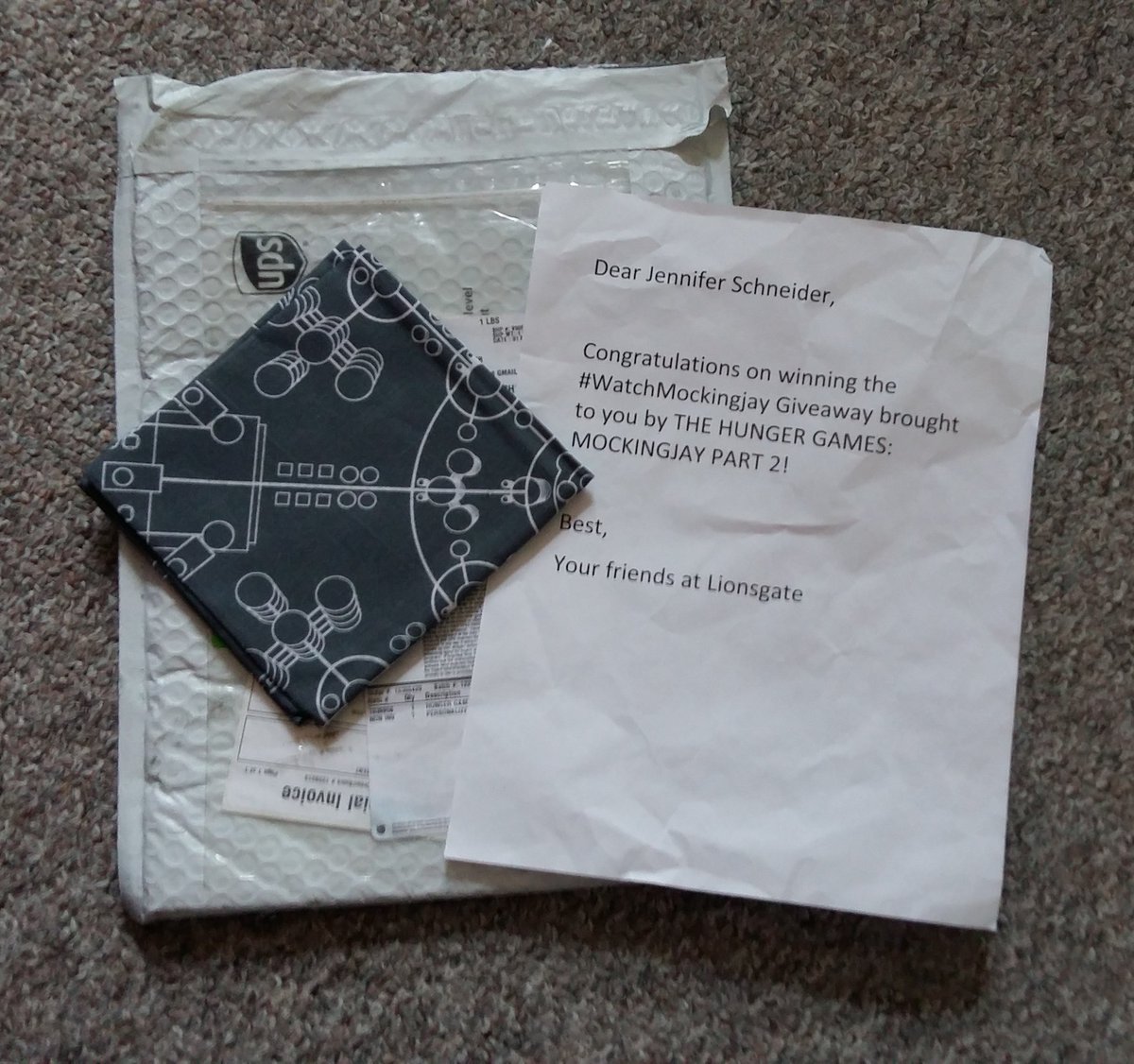 RoaringJuliet's tweet photo. Look what just came in the mail! Thank you so much for this awesome #WatchMockingjay prize π¦π₯ https://t.co/C5uA6yfTl4