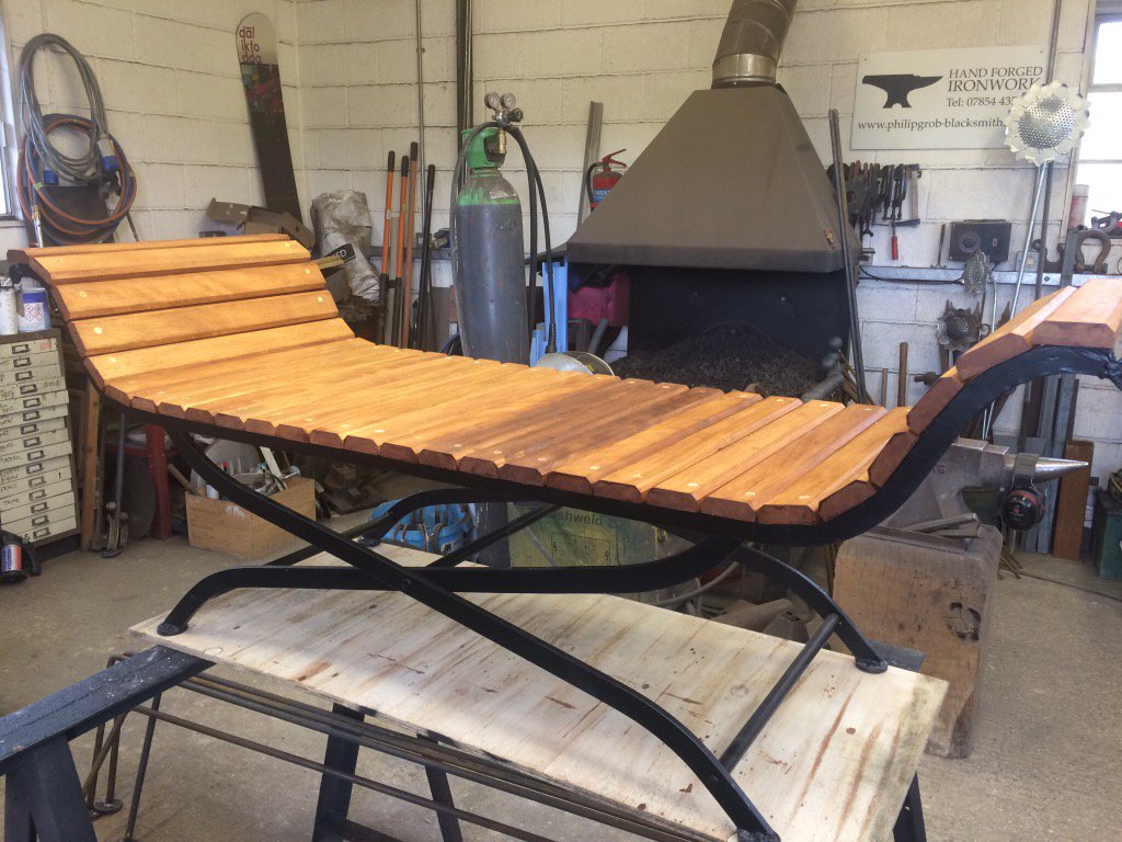 grobblacksmith's tweet photo. Put the hardwood slats onto the bench frame ready for the summer to arrive. Delivery tomorrow. https://t.co/OP6IjNkwjG
