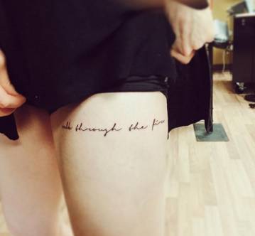 tattoofilterus's tweet photo. “Walk through the fire” tattoo on Sara’s left thigh, part of a Charles Bukowski quote. Tat… https://t.co/ZdwKMmHcxy https://t.co/ETDzLOcxQB