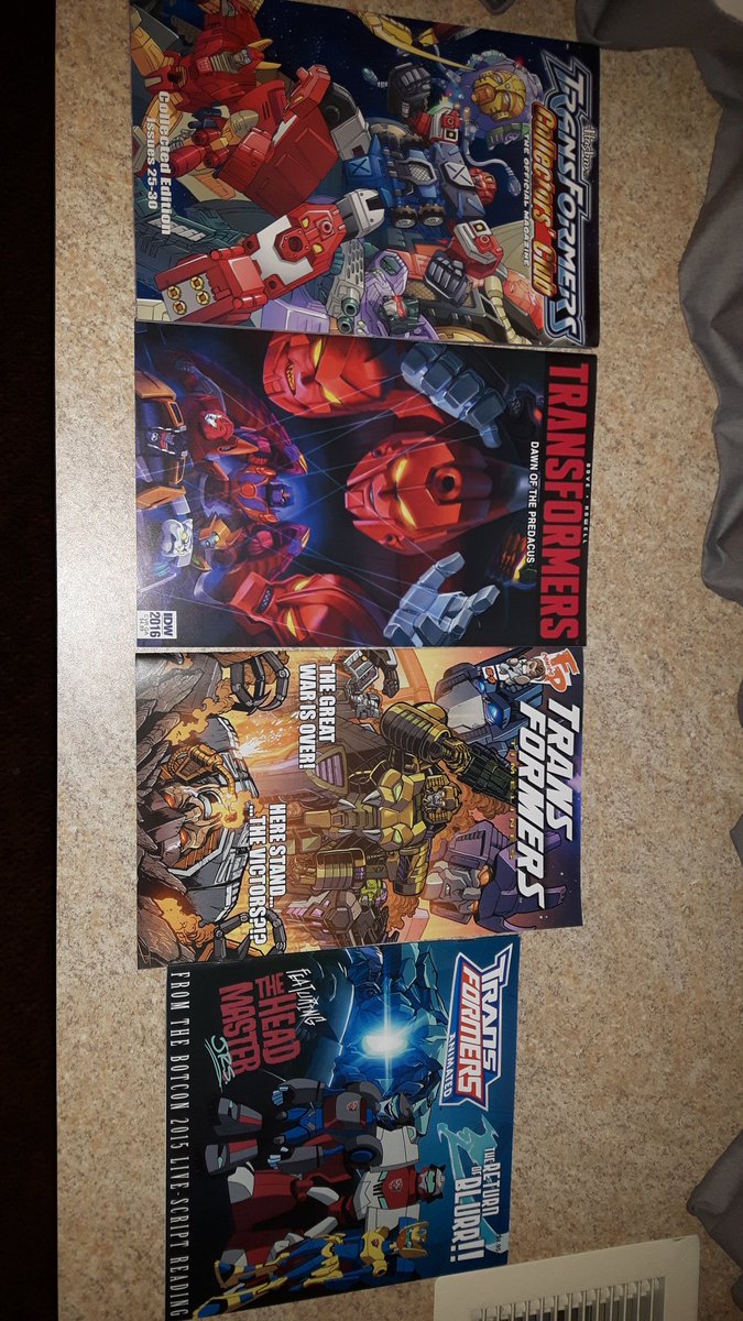 DWallsEpicHauls's tweet photo. First non toy #botcon16 haul. Exclusive comic cover, cards &amp; Magnaboss stickers, lithographs &amp; finally shot glasses https://t.co/gjjKQQQCnK