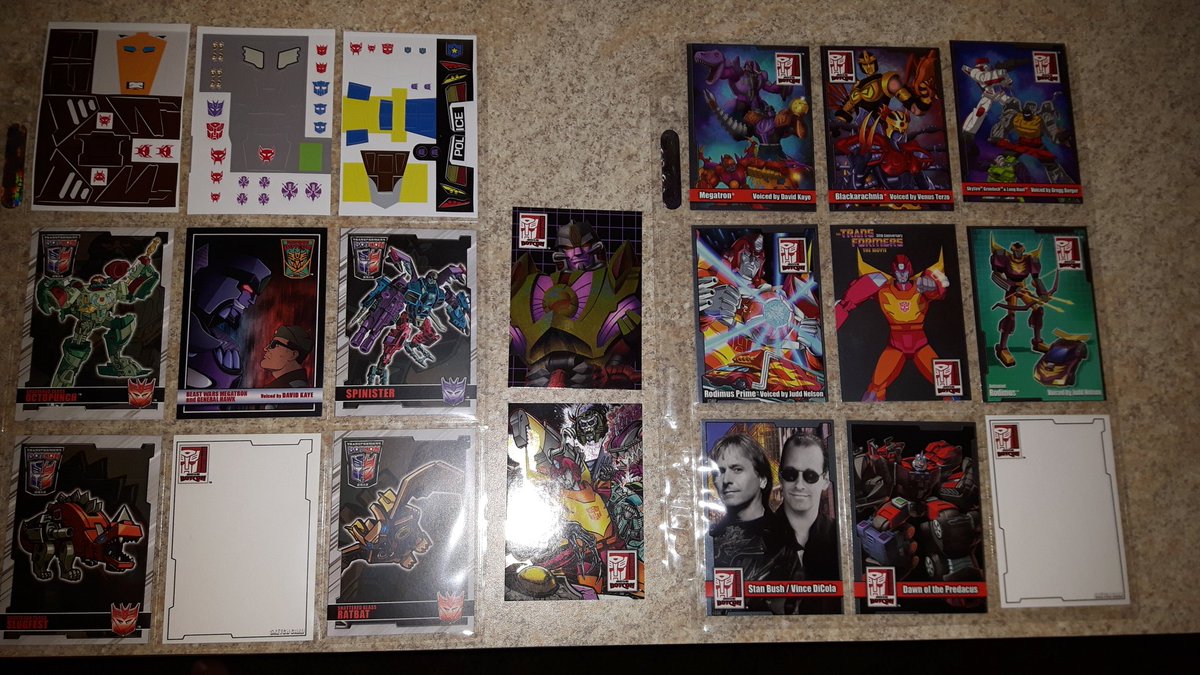 DWallsEpicHauls's tweet photo. First non toy #botcon16 haul. Exclusive comic cover, cards &amp; Magnaboss stickers, lithographs &amp; finally shot glasses https://t.co/gjjKQQQCnK